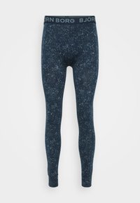 Marinefarbene Leggings mit einem elastischen Bund, die ein dezentes florales Muster und eine schmale Passform aufweisen. Die Textur wirkt glatt und dehnbar.