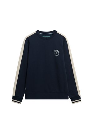 Sudadera azul marino con cuello redondo, rayas de contraste en crema en los hombros, puños a rayas y logo de "Superdry" en el pecho. Mezcla de algodón suave.