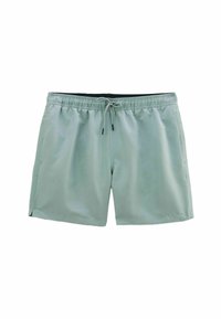 Shorts de bain vert clair en tissu à séchage rapide, dotés d'une taille élastique avec cordon de serrage et de poches latérales.