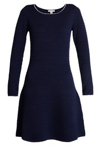 Mörkblå klänning med långa ärmar och utsvängd fåll, med ett strukturerat ribbat mönster och rund halsringning med en vit accent.