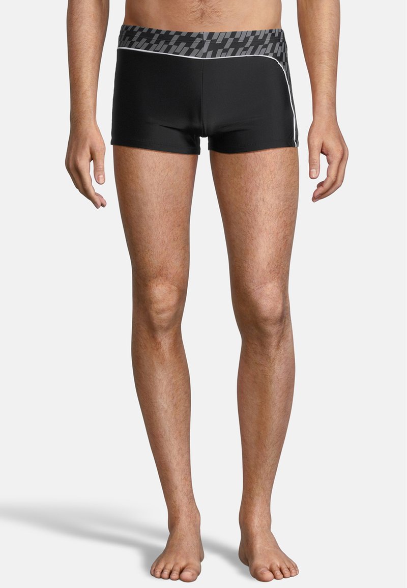 Shorts de bain noirs avec une taille à motifs et des accents blancs sur les côtés. Longueur courte, fabriqués en matériau lisse et extensible.