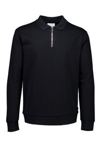 Polo shirt nero a maniche lunghe con zip a un quarto, colletto e polsini a coste. Tessuto liscio e design aderente.