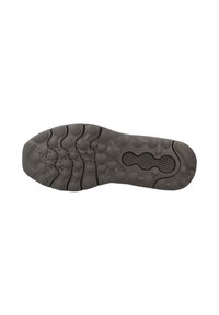 Gray rubber shoe sole with a textured surface, featuring circular and oval patterns for grip, and a flexible design for comfort.