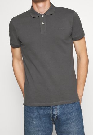 Grey cotton polo shirt with a collared neck, two-button placket, and short sleeves, featuring a subtle logo on the chest.