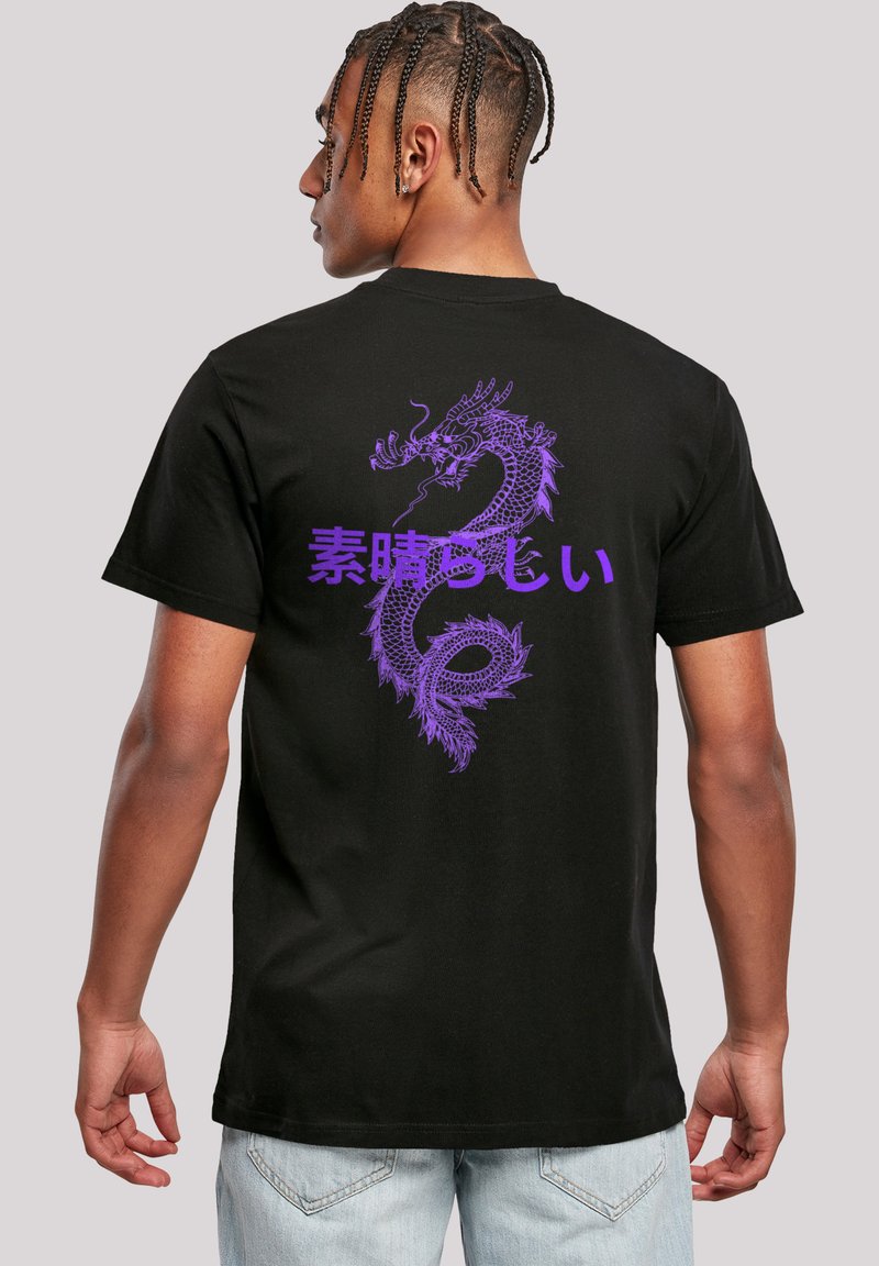 Black cotton t-shirt featuring a purple dragon design and Japanese text on the back. Short sleeves and a relaxed fit.