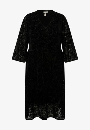 Vestido de terciopelo negro con escote en V, mangas largas y un estampado floral. El dobladillo es ligeramente acampanado y presenta un acabado texturizado.