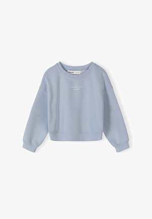 Svetlo modra skrajšana jopa z dolgimi rokavi in izvezenim napisom "London Town 1995 UK" na prsih.