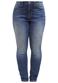 Sininen farkut, joissa on kapea malli, kevyesti haalistunut ja hienovaraisia kulutettuja yksityiskohtia. Viiden taskun malli, klassinen vyötärö ja nappisulku.