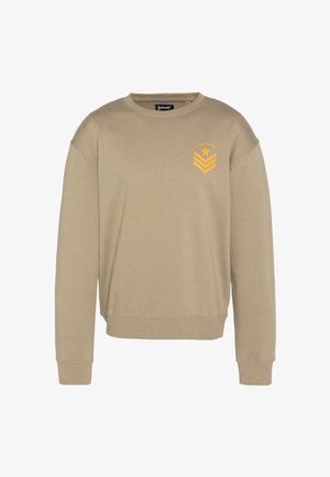 Beige Sweatshirt mit Rundhalsausschnitt, gerippten Bündchen und Saum. Mit einem orangen Stern- und Chevron-Motiv auf der Brust. Weicher, legerer Stoff.