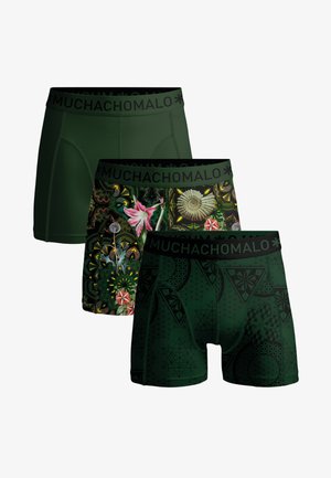 Tri tamnozelje muške bokserice s crnim pojasom; jedne jednobojne, jedne s cvjetnim i školjkastim uzorkom, i jedne s geometrijskim dizajnom.