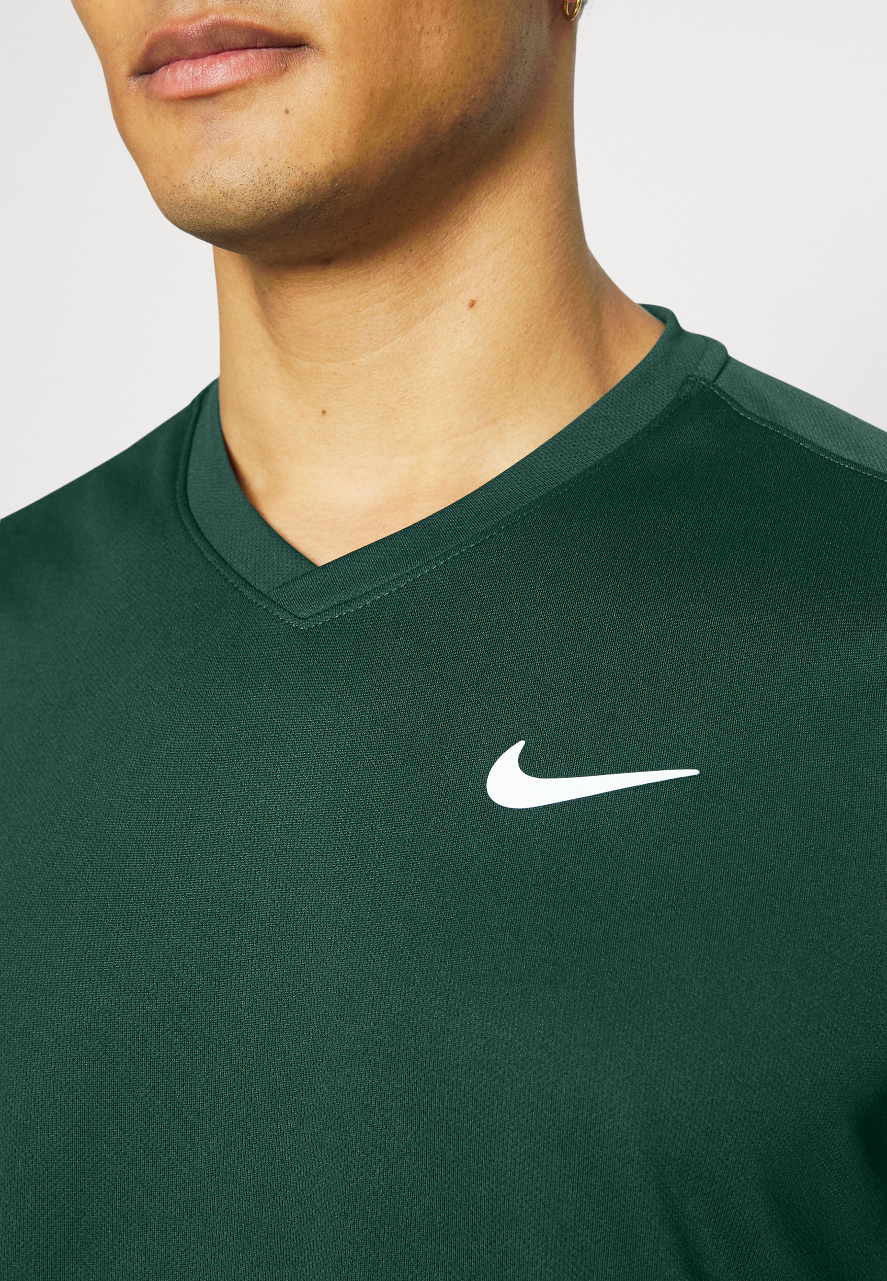 hunter green nike shirt