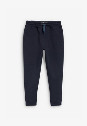 Sötét tengerészkék jogger nadrág, puha, tartós anyagból készült, elasztikus derékrésszel és állítható zsinórral. Oldalsó zsebekkel és beszűkített lábrésszel rendelkezik.