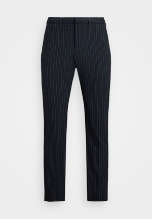 Pantaloni navy cu dungi, cu croi slim, prezentând un front plat, bucle pentru curea și o textură fină. Design tailored cu un finisaj curat.
