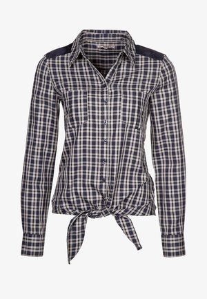 Dunkelblaues und weißes karriertes Hemd mit langen Ärmeln, Knopfverschluss, zwei Brusttaschen und vorn gebundenem Detail. Weiche, gewebte Stofftextur.