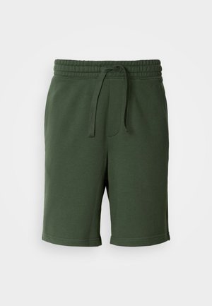 Dark green shorts with an elastic waistband, drawstring detail, pockets, and a soft cotton blend fabric. Mid-thigh length.