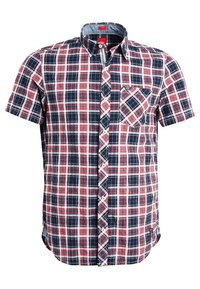 Chemise à manches courtes boutonnée avec motif à carreaux rouge, bleu marine et blanc et une poche poitrine à gauche.