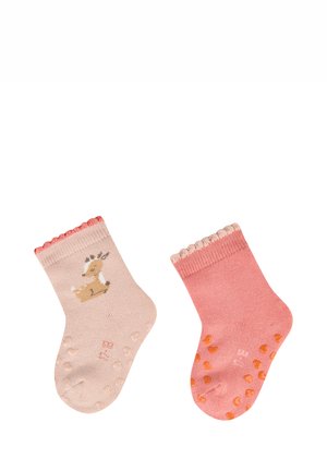 Two toddler socks, one light pink with a deer illustration, and one solid pink, both with non-slip grips on the soles.