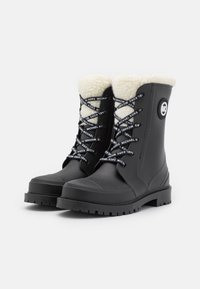 MICHAEL Michael Kors Bottes en caoutchouc - black