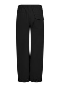 Schwarze, locker sitzende Hose mit elastischem Bund, einer Klappentasche auf der rechten Rückseite und Druckknopfverschlüssen an den Beinabschlüssen.