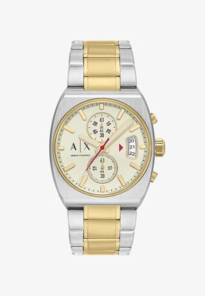 Reloj de acero inoxidable con eslabones en tono plateado y dorado. La esfera redonda en color crema cuenta con tres subesferas, índices horarios dorados y manecillas rojas.