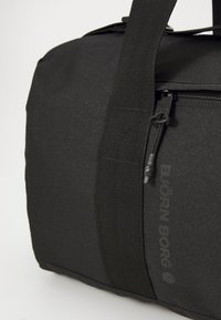 Björn Borg GYM BAG UNISEX - Športová taška - black beauty