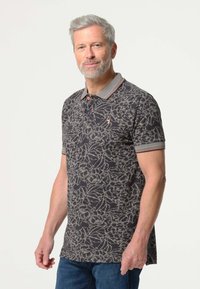 Korte mouwen polo t-shirt in donkergrijs met bloemenpatroon, contrasterende kraag met rode accenten en een twee-knopen sluiting. Katoenmengsel stof.