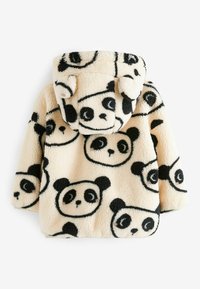 Veste duveteuse couleur crème avec des visages de panda noirs et blancs et de petites oreilles en tissu sur la capuche, vue de dos.