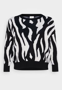 Πλεχτό πουλόβερ με μοτίβο μαύρης και λευκής ζέβρας. Διαθέτει στρογγυλή λαιμόκοψη και μακρυά μανίκια με άνετη εφαρμογή.