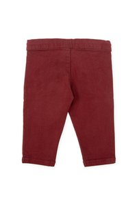Leggings en coton bordeaux avec une coupe ajustée, une taille élastique et un ourlet cousu ; sans poches ni accents décoratifs.