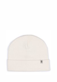 Cream-colored knit beanie with a folded cuff, made of soft material, featuring a small branded label on the side. Simple and seamless design.