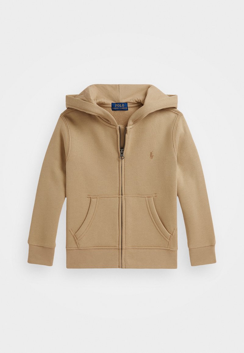 Tan zip-up hoodie made of textured fabric, featuring a front zipper, two front pockets, and a hood with a logo embroidered on the chest.