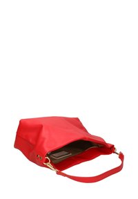 Borsa a mano in pelle rossa con una forma strutturata, dotata di una chiusura con zip, accentuata da elementi in ottone dorato e un interno aperto che mostra una fodera marrone.