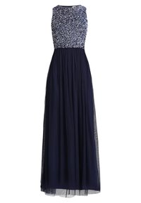 Mörkblå maxiklänning med blommönstrad överdel, ärmlös design och flyttande tullekjol för en lätt och elegant look.