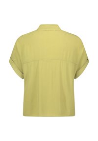 Short-sleeve shirt in light yellow fabric with a collared neckline, back yoke detail, and rolled cuffs. Smooth texture, casual design.