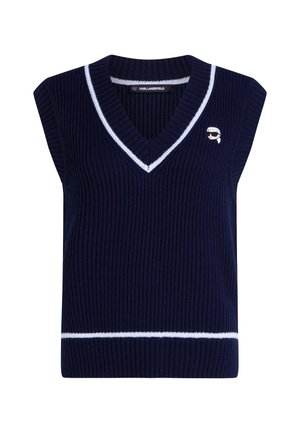 Navy ribbed knit sleeveless sweater with a v-neck and white striped accents. Features a small logo embroidered on the chest.