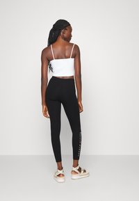Tommy Hilfiger HERITAGE - Legíny - kalhoty  - black