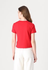 Calvin Klein Jeans MONOLOGO BABY TEE - Marškinėliai su spaudiniu - red