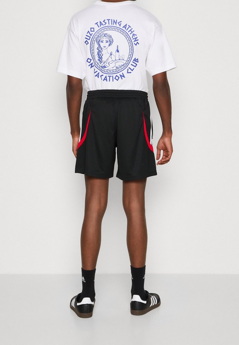 adidas Originals Tracksuit bottoms black (Pre-owned) Zalando