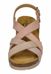 Pink suede sandal with crisscross straps and a cork platform sole. Features a buckle closure and a cushioned insole for comfort.