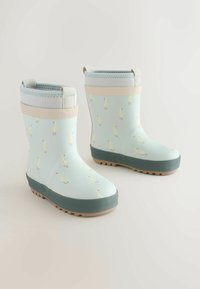 Hellblaue Regenstiefel mit gelbem Entenmuster, Gummimaterial, grauer Sohle und einem hellgrauen Bündchen mit Zuglaschen für einfaches Anziehen.