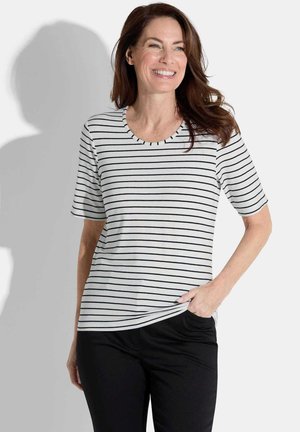 T-shirt rayé en blanc et noir, avec un col rond et des manches courtes, fabriqué dans un tissu doux avec une coupe décontractée.