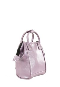 Small structured handbag in glossy lavender faux leather, featuring dual handles, a zip closure, and black fabric accents.