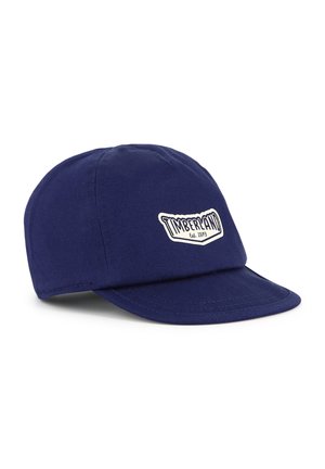 Casquette de baseball bleu marine en coton, avec un écusson blanc "Timberland" sur le devant. Couronne arrondie et visière rigide.