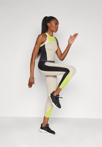 Puma FIT TRAIN STRONG FITTED TANK - Top - putty