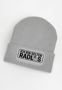 Gray knit beanie with a folded cuff, featuring a rectangular white patch. Black text on the patch reads "ICH BIN SELTEN RADLOS" with a bicycle icon.