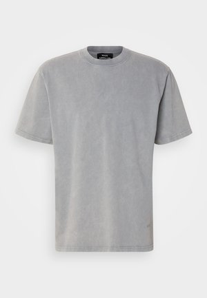 Gray cotton t-shirt with a round neckline and short sleeves. Features a soft, textured finish and a subtle logo on the lower side.