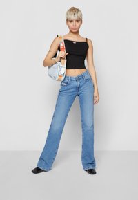 Diesel 1969 D-EBBEY DIESEL LIBRARY - Calças de ganga à boca de sino - denim