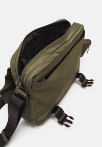 Guess CERTOSA UNISEX - Torba preko tijela - army green