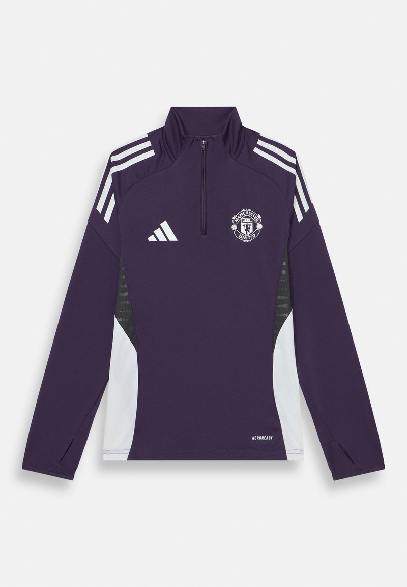 Veste de sport violette à demi-zip avec des panneaux latéraux blancs, trois rayures blanches sur les épaules, logo de Manchester United sur la poitrine et accents texturés.