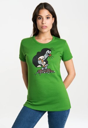 Green cotton t-shirt featuring a cartoon mole character holding a shovel, with a design of dirt and stones beneath it. Round neckline and short sleeves.